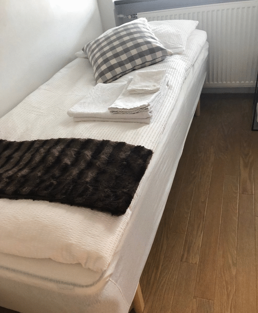 Single room with shared bathroom